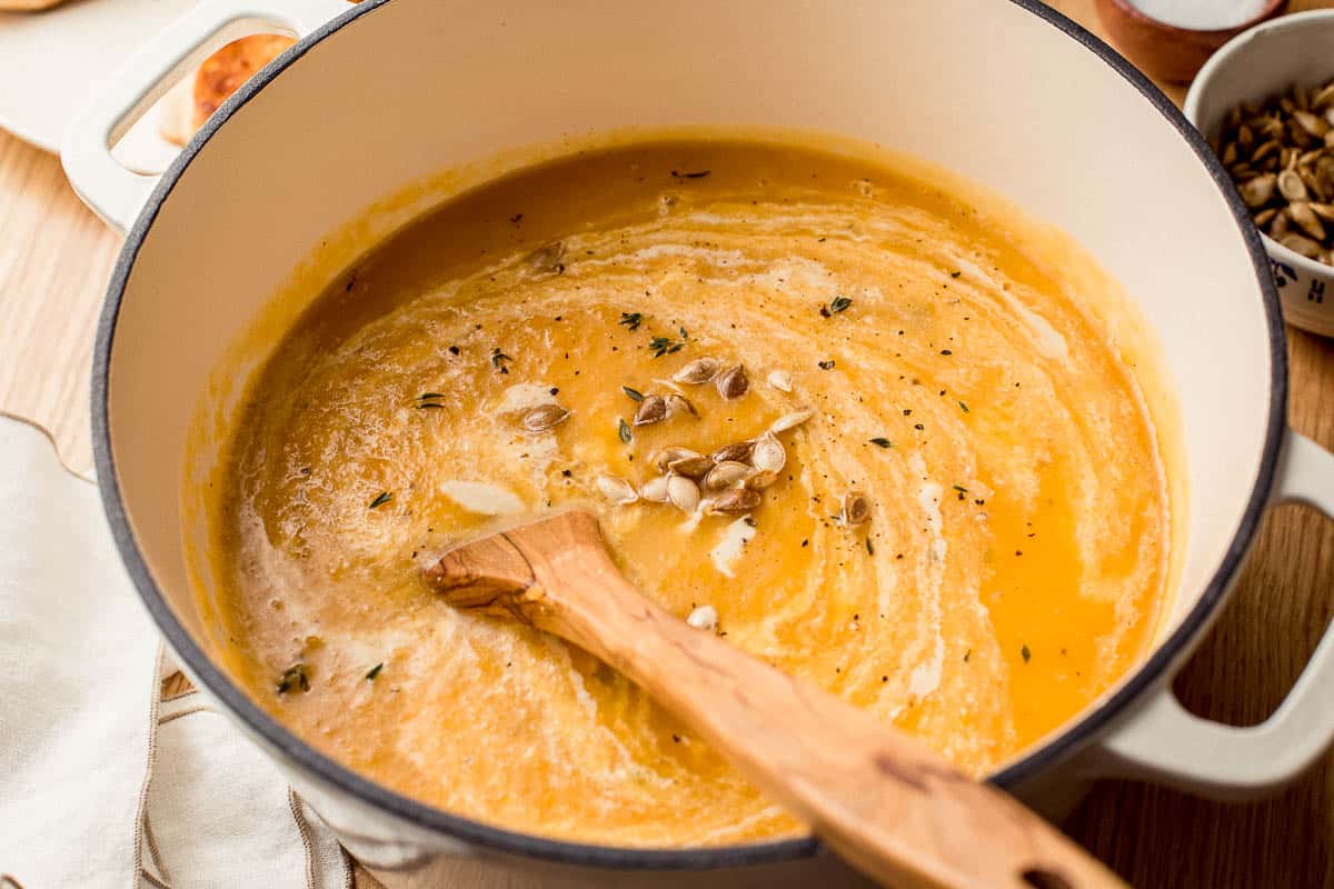 Roasted butternut squash soup in a stockpot after it has been blended.