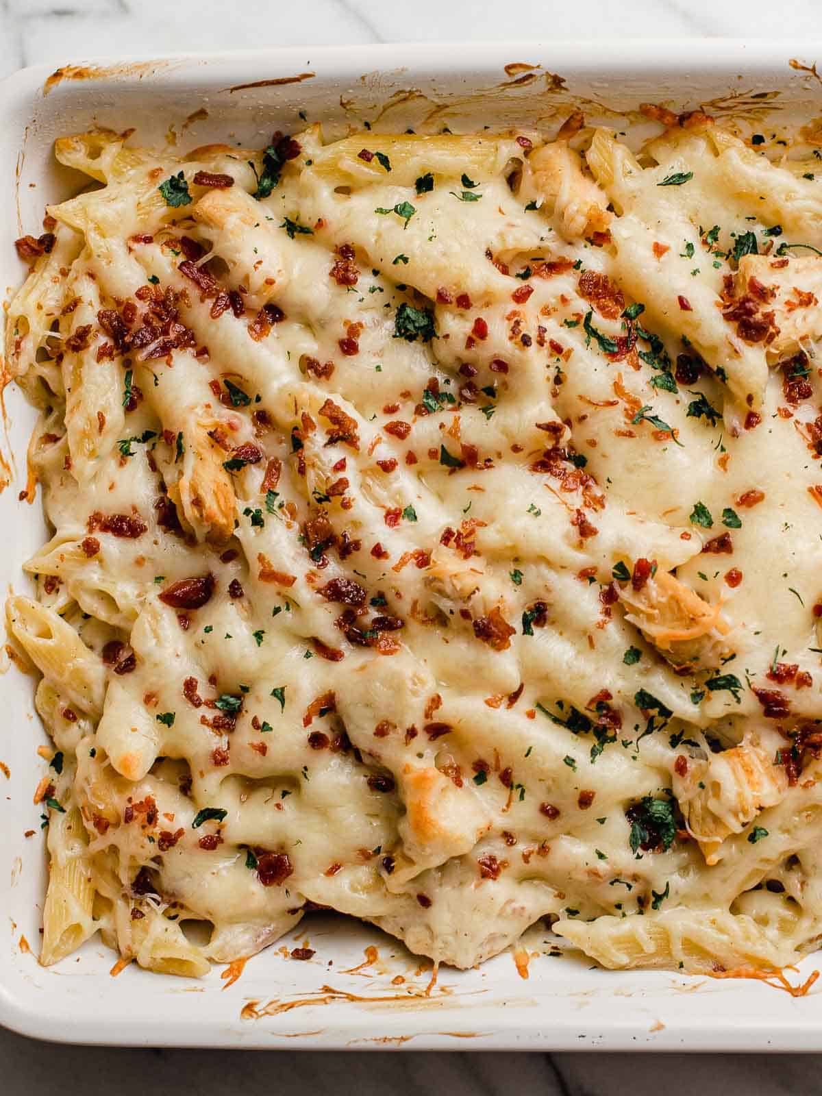 Chicken bacon ranch casserole baked in a dish.