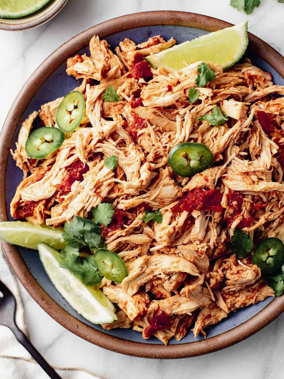Instant Pot Mexican Shredded Chicken on a serving platter.