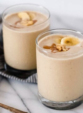 Peanut butter banana smoothies in glasses