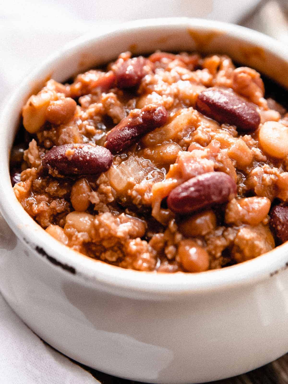 Slow cooker calico beans in a bowl.