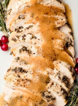 Slow cooker turkey breast on a serving platter.
