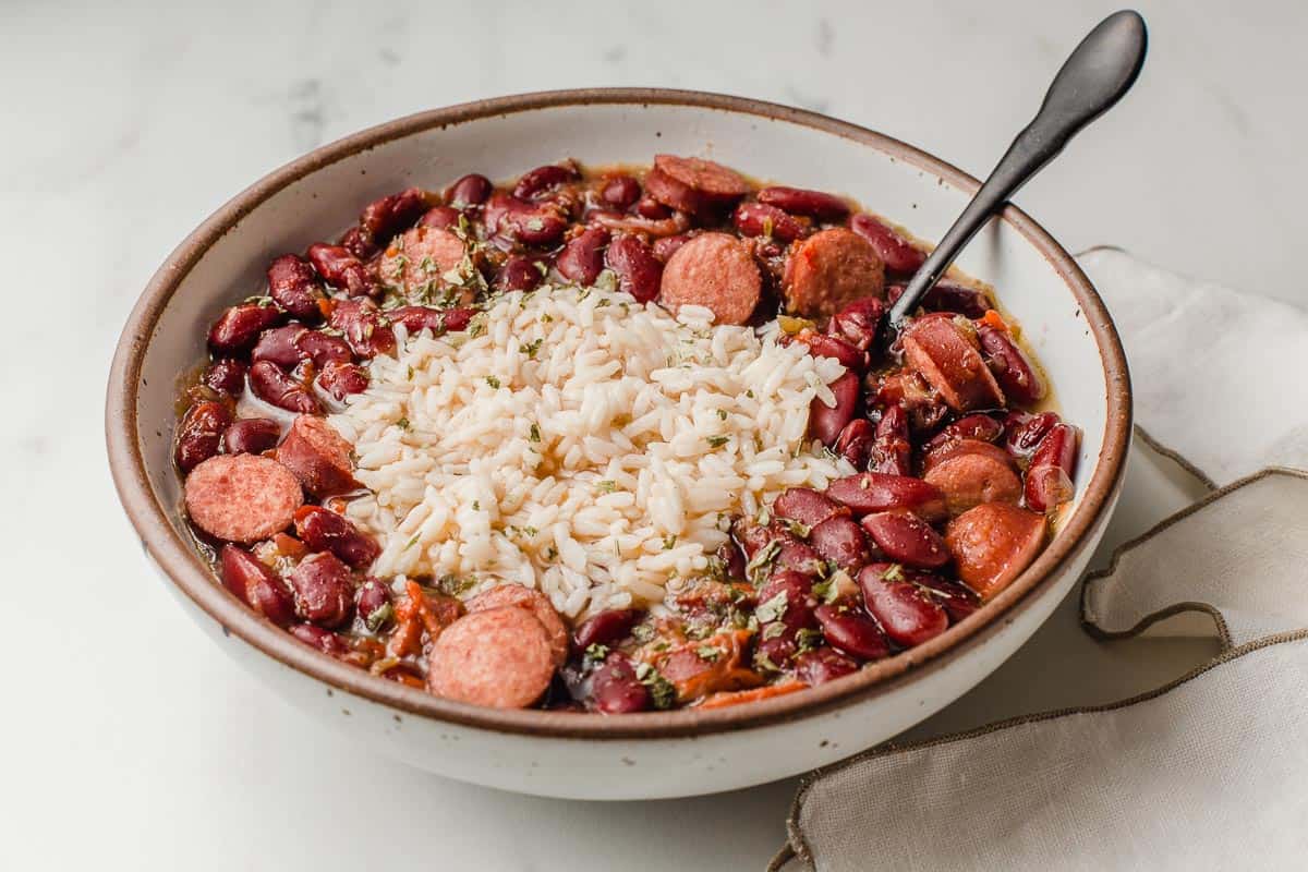 Slow cooker red beans and rice in a bowl on a table.