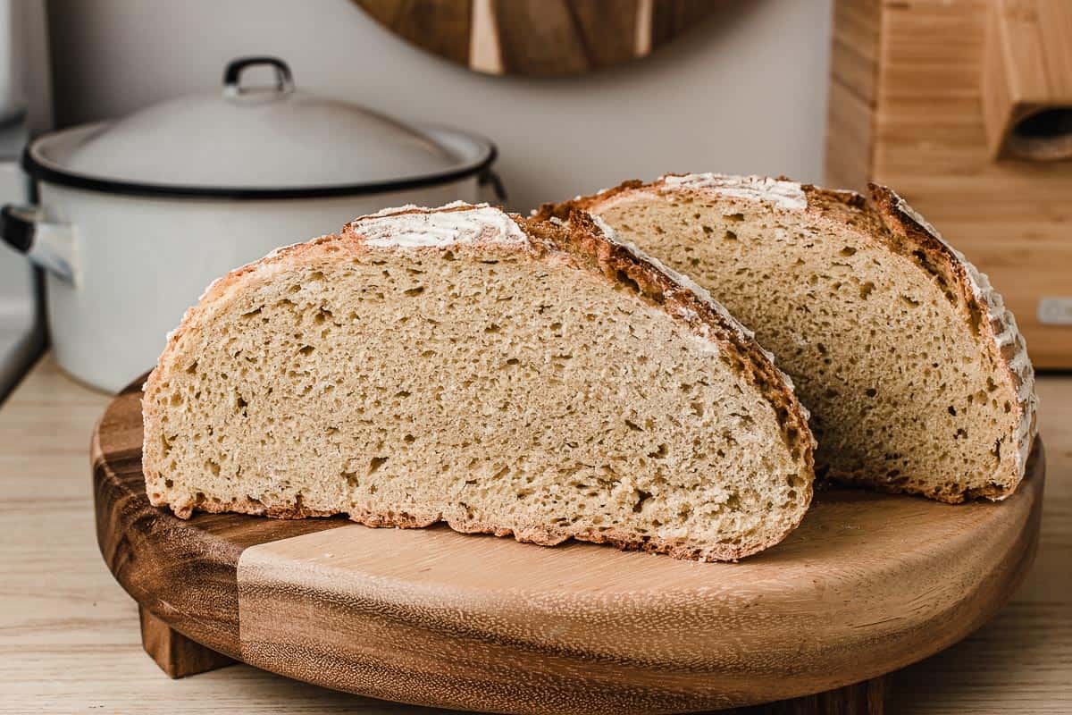A loaf of einkorn sourdough bread cut in half.