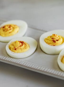 A platter of deviled eggs on the counter.