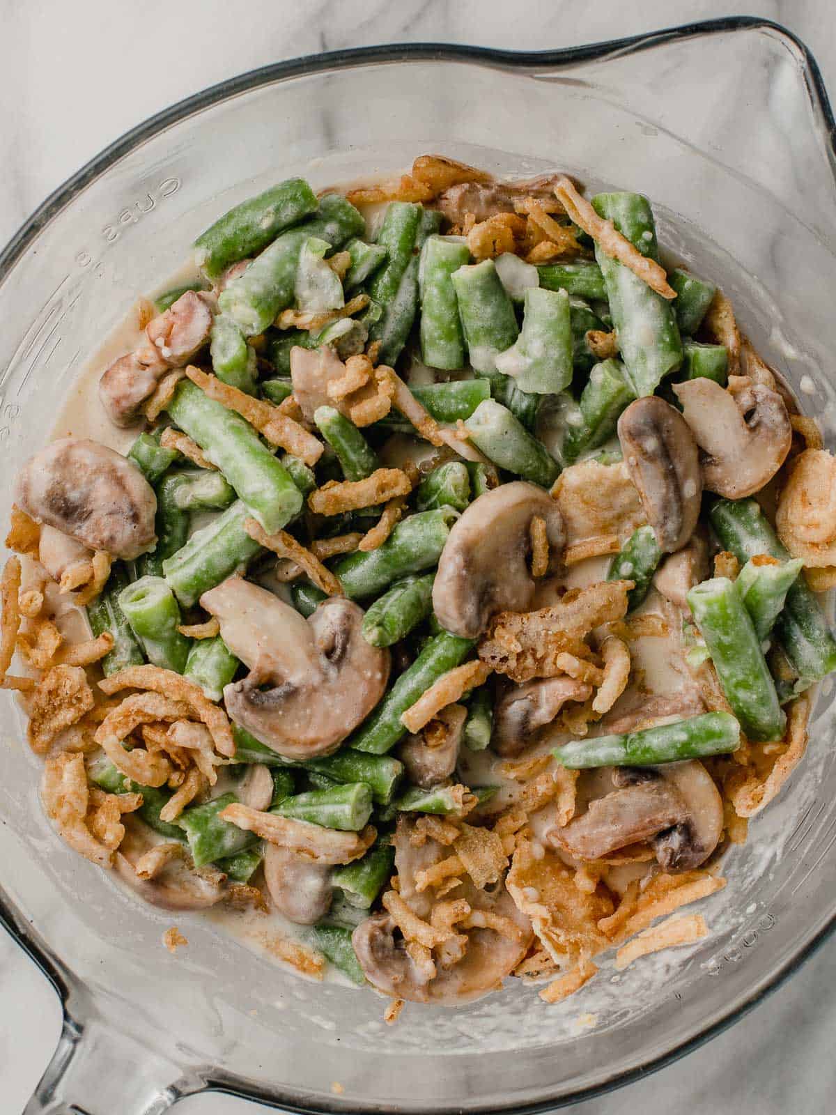 Green bean casserole ingredients in a large bowl.