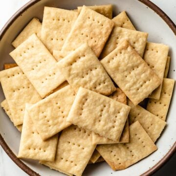 Sourdough butter crackers in a bowl on the table.