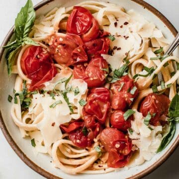 Cherry Tomato Sourdough Pasta in a bowl with basil.