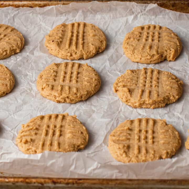 A baking sheet with sourdough peanut butter cookies.