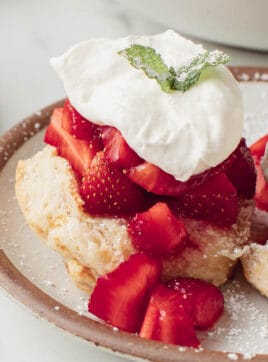 Sourdough strawberry shortcake on a plate.