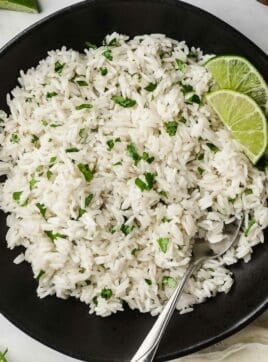 Cilantro lime rice in a black bowl.