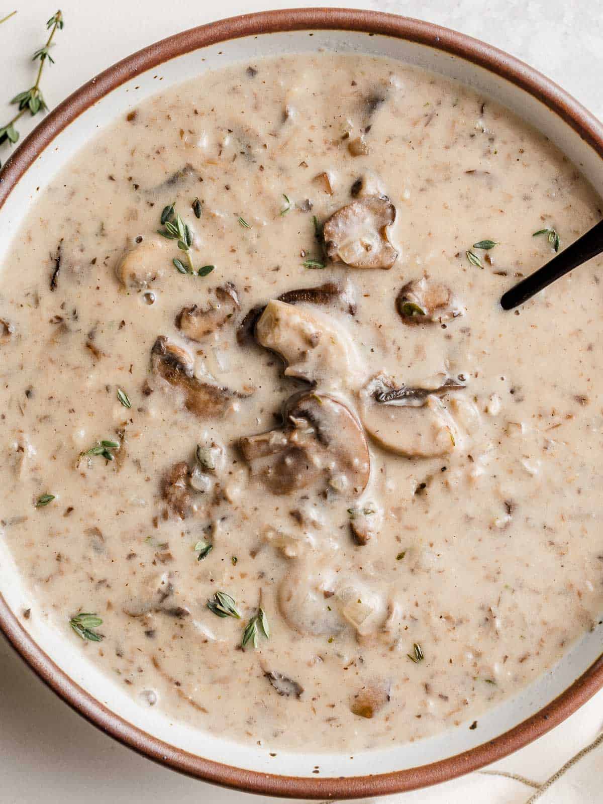 Creamy mushroom soup in a bowl.