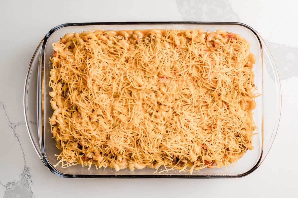 Cheeseburger  casserole ingredients in a baking dish.