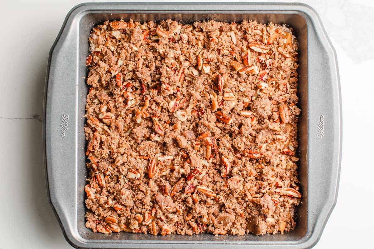 Fourth layer sourdough pumpkin coffee cake batter in a dish.