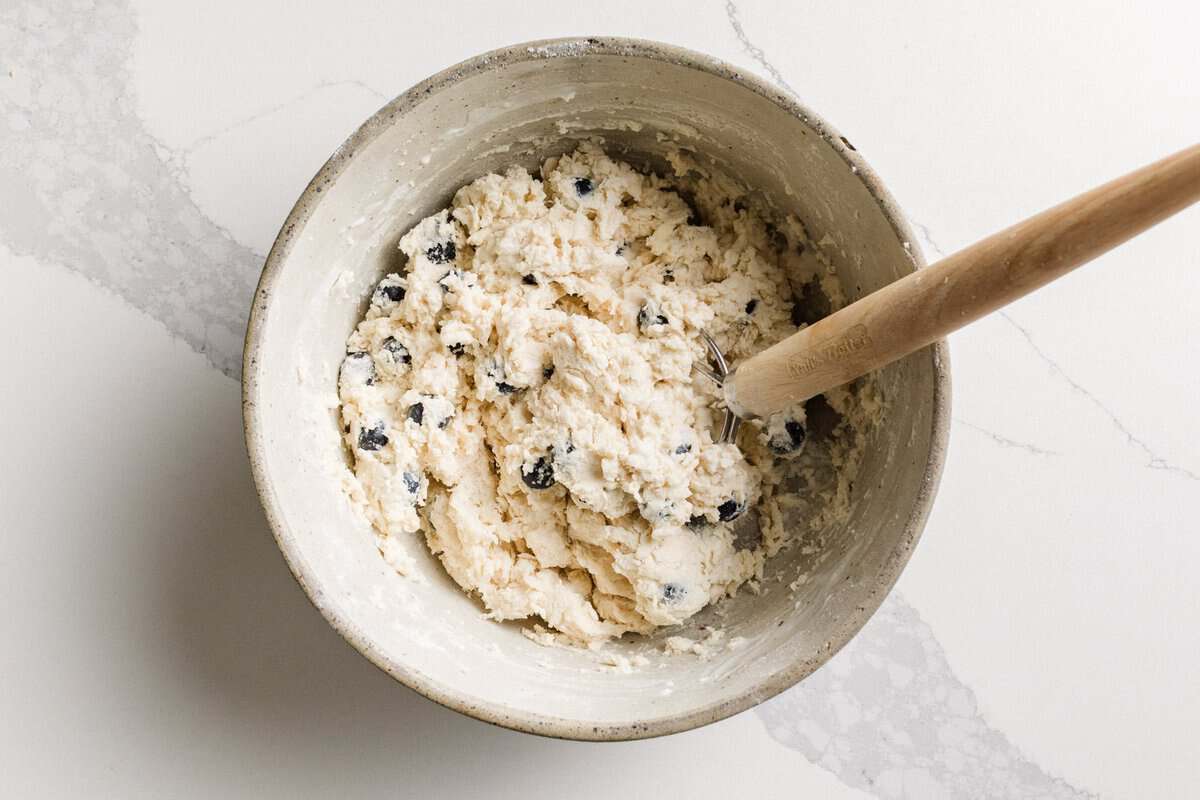 Sourdough Blueberry Biscuits dough in a bowl.
