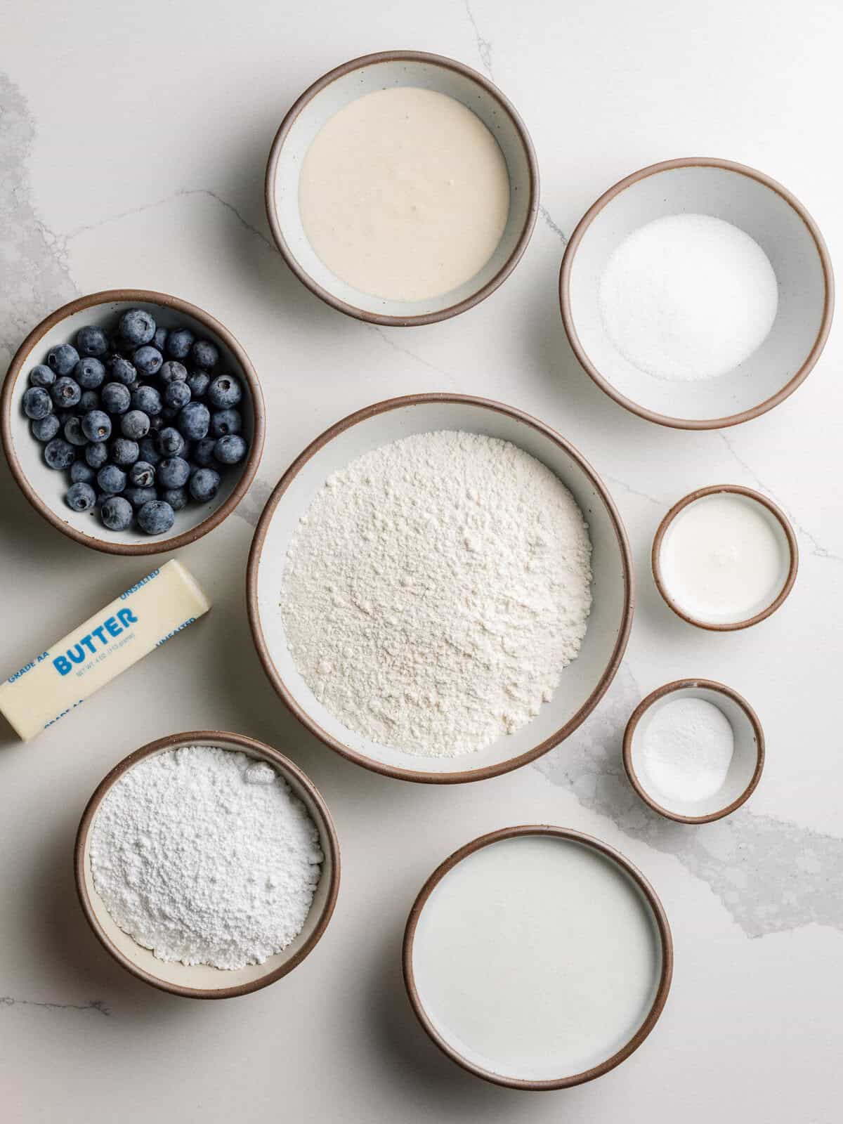 Sourdough blueberry biscuits ingredients on a table.
