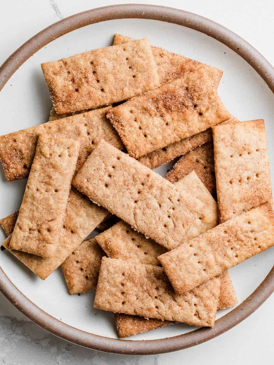 Sourdough cinnamon sugar crackers on a plate.